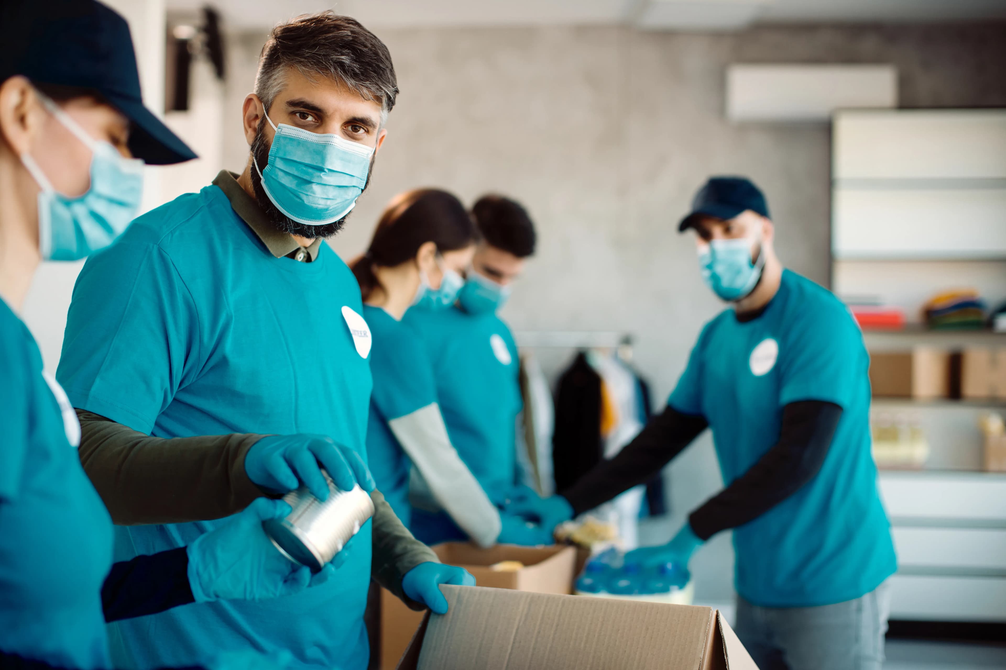 group-people-with-protective-face-masks-packing-donation-boxes-food-charity group-people-with-protective-face-masks-packing-donation-boxes-food-charity